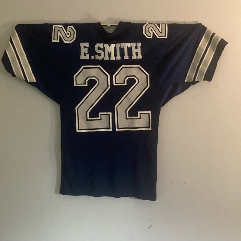 Authentic 1994 Emmitt Smith 75th anniversary edition by Rawlings. With NFL logo.